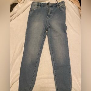 Rollas light wash straight leg jeans. New with tags